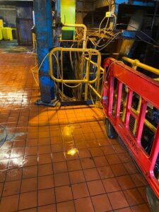 Floor area contaminated with oil after hazardous spill incident